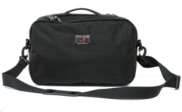 The top pocket of the Hero's Journey in Black (black with grey grid) 400 Halcyon converted into a shoulder bag.